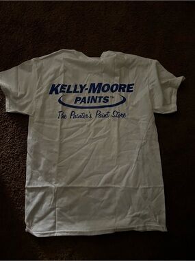 Kelly Moore White T-Shirt with Blue Tag Detail